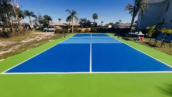 a view of a park with a slide