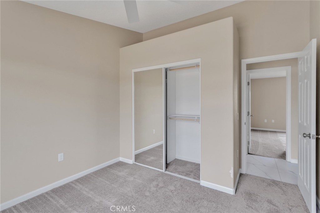 12584 Mesquite Road Apple Valley, CA 92308 - Photo 23 of 44 wooden floor and closet in a room