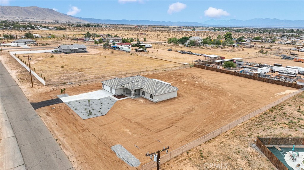 12584 Mesquite Road Apple Valley, CA 92308 - Photo 36 of 44 a view of an ocean and beach