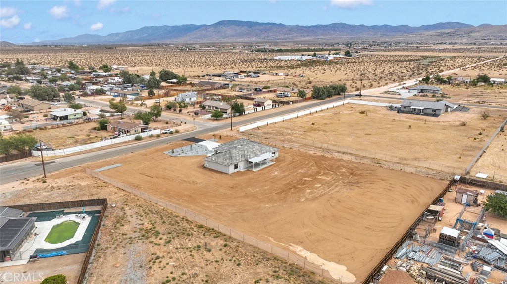 12584 Mesquite Road Apple Valley, CA 92308 - Photo 42 of 44 an aerial view of residential houses with outdoor space