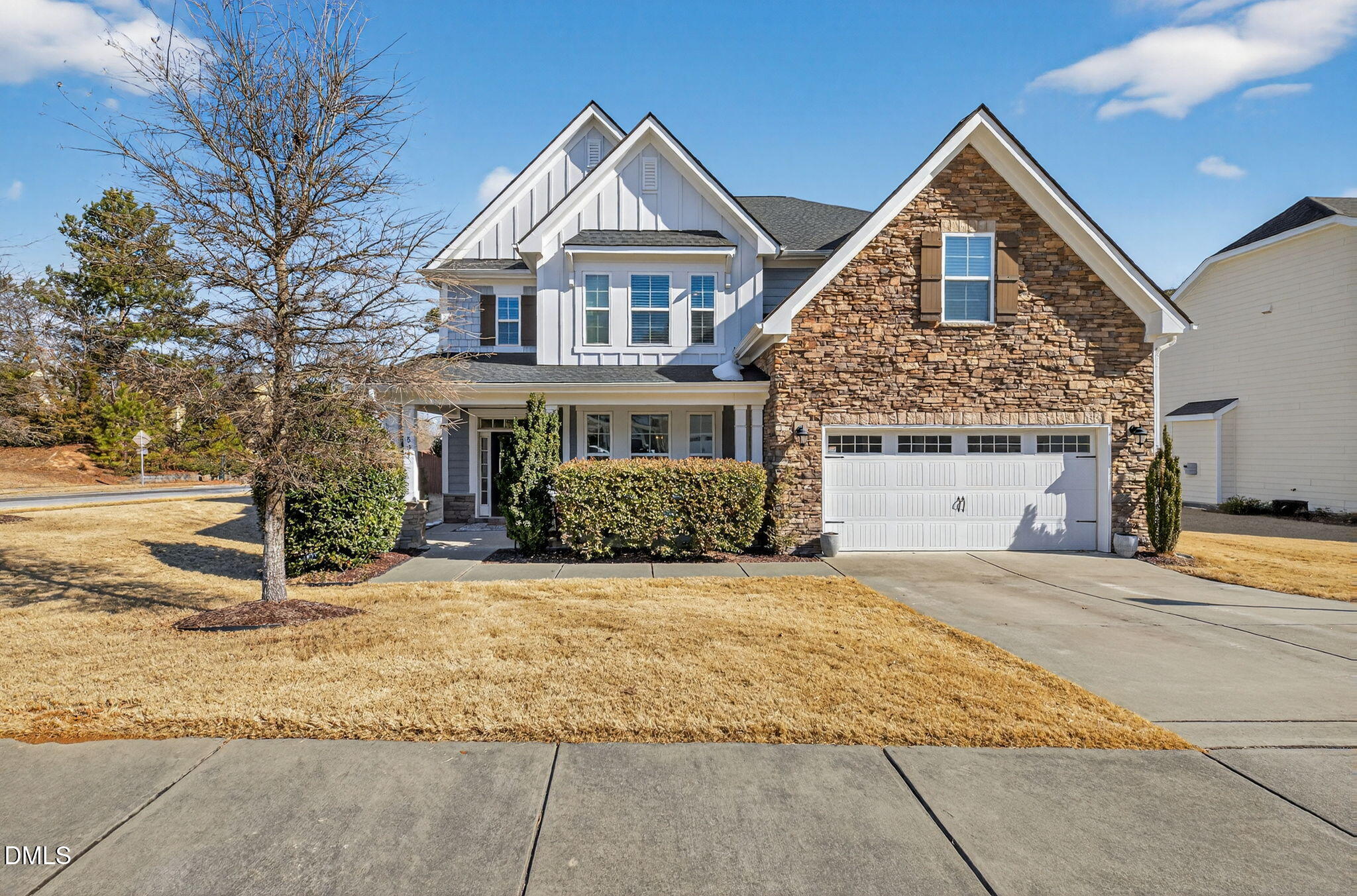 801 Tree Green Lane Wake Forest, NC 27587 - Photo 1 of 28 a front view of a house with a yard