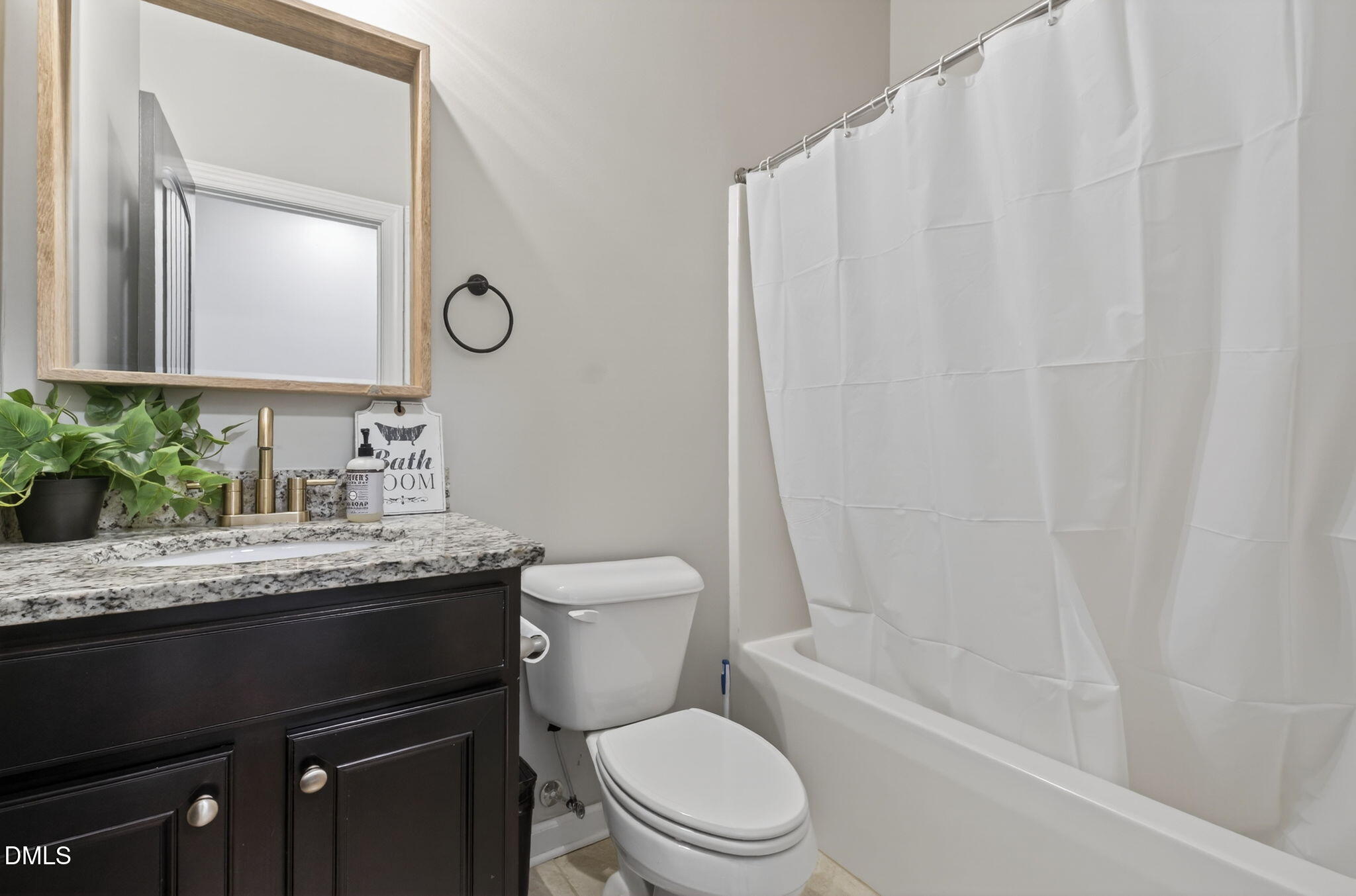 801 Tree Green Lane Wake Forest, NC 27587 - Photo 14 of 28 a bathroom with a granite countertop sink toilet and shower