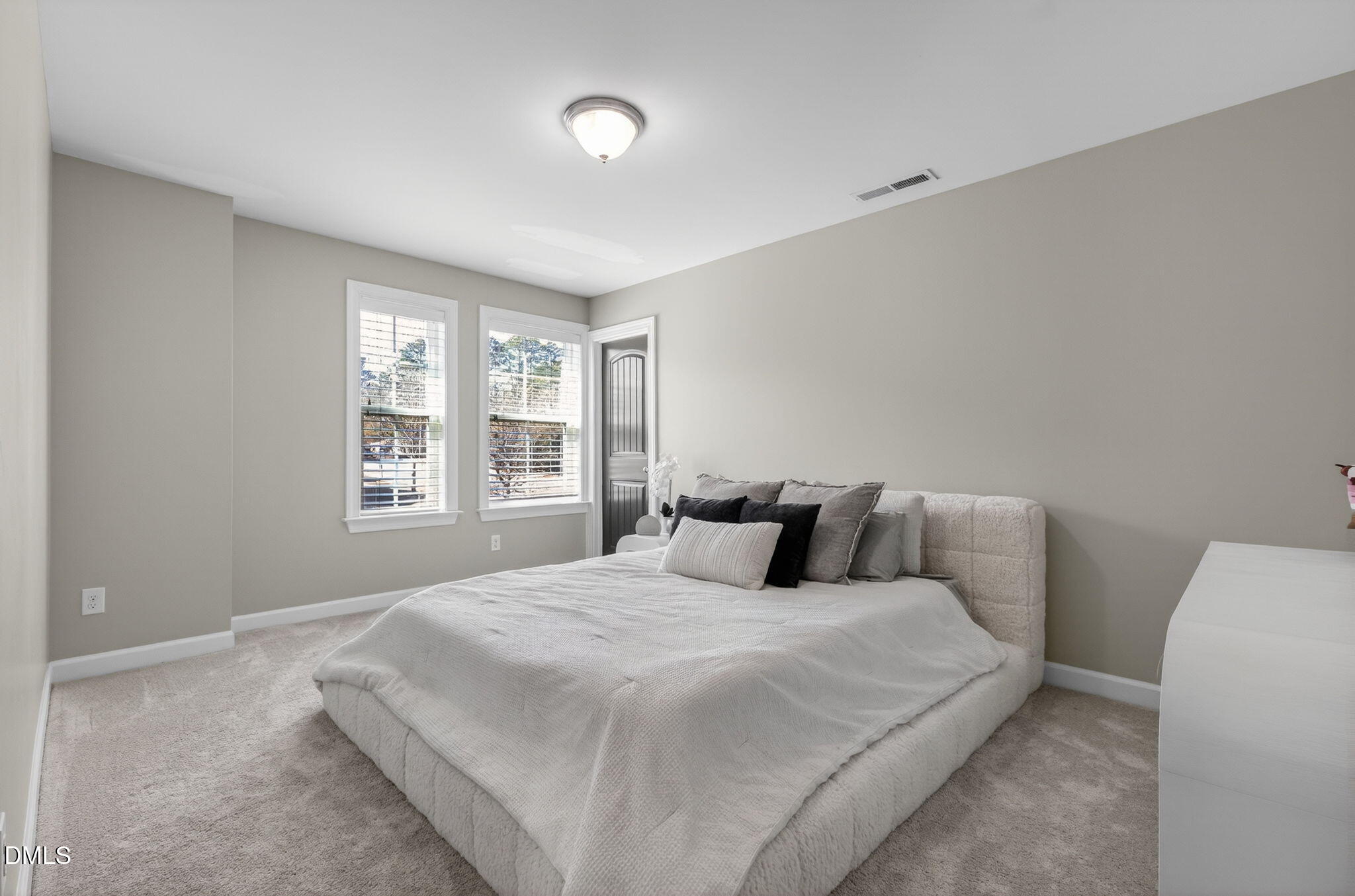 801 Tree Green Lane Wake Forest, NC 27587 - Photo 15 of 28 a bedroom with a bed and a window