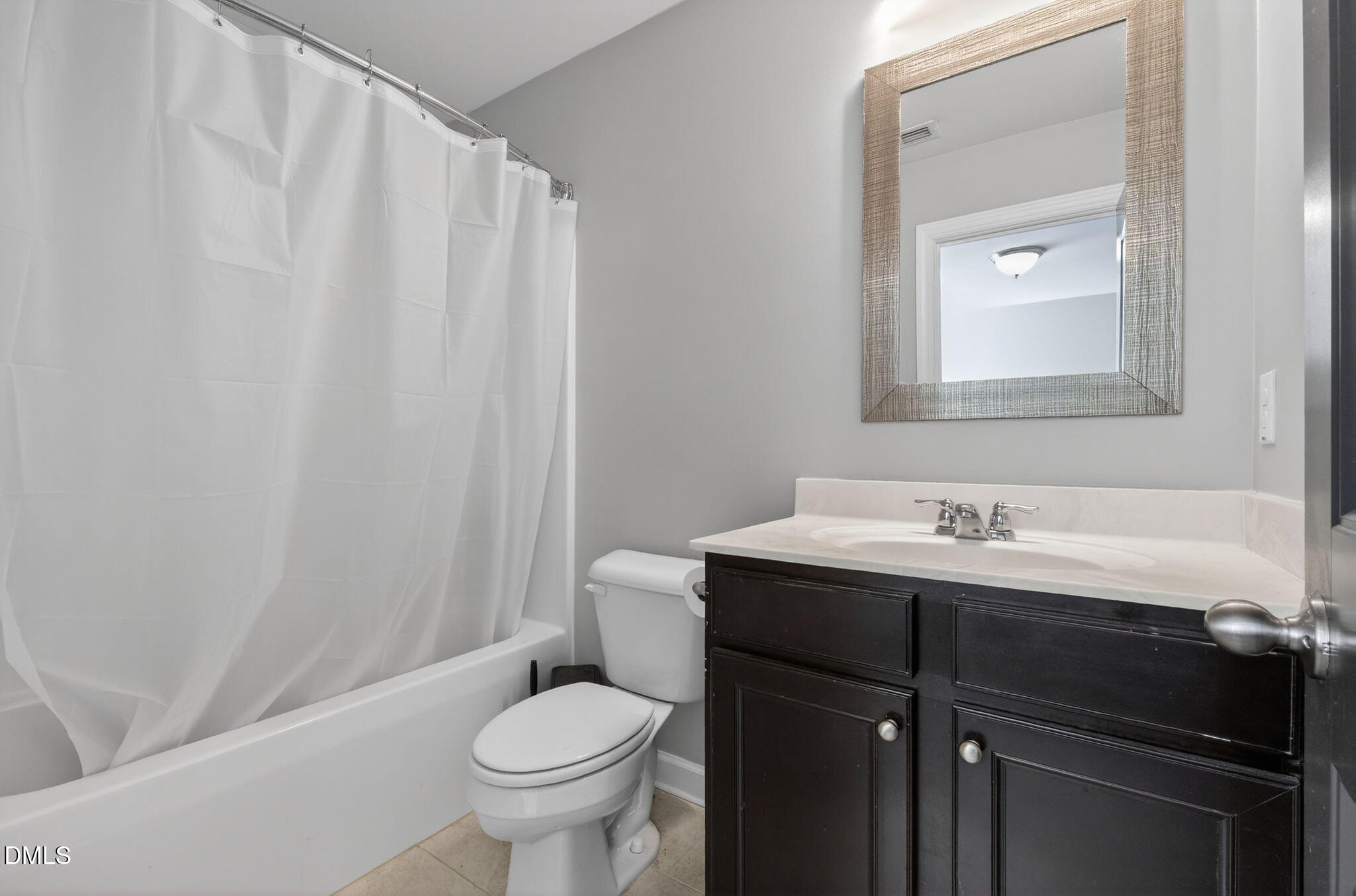 801 Tree Green Lane Wake Forest, NC 27587 - Photo 18 of 28 a bathroom with a sink toilet and vanity