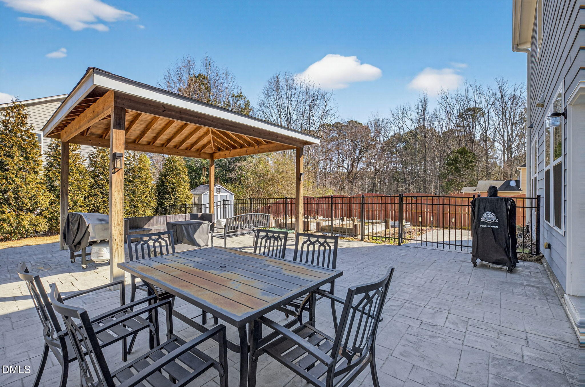801 Tree Green Lane Wake Forest, NC 27587 - Photo 25 of 28 a view of a chairs and table in patio