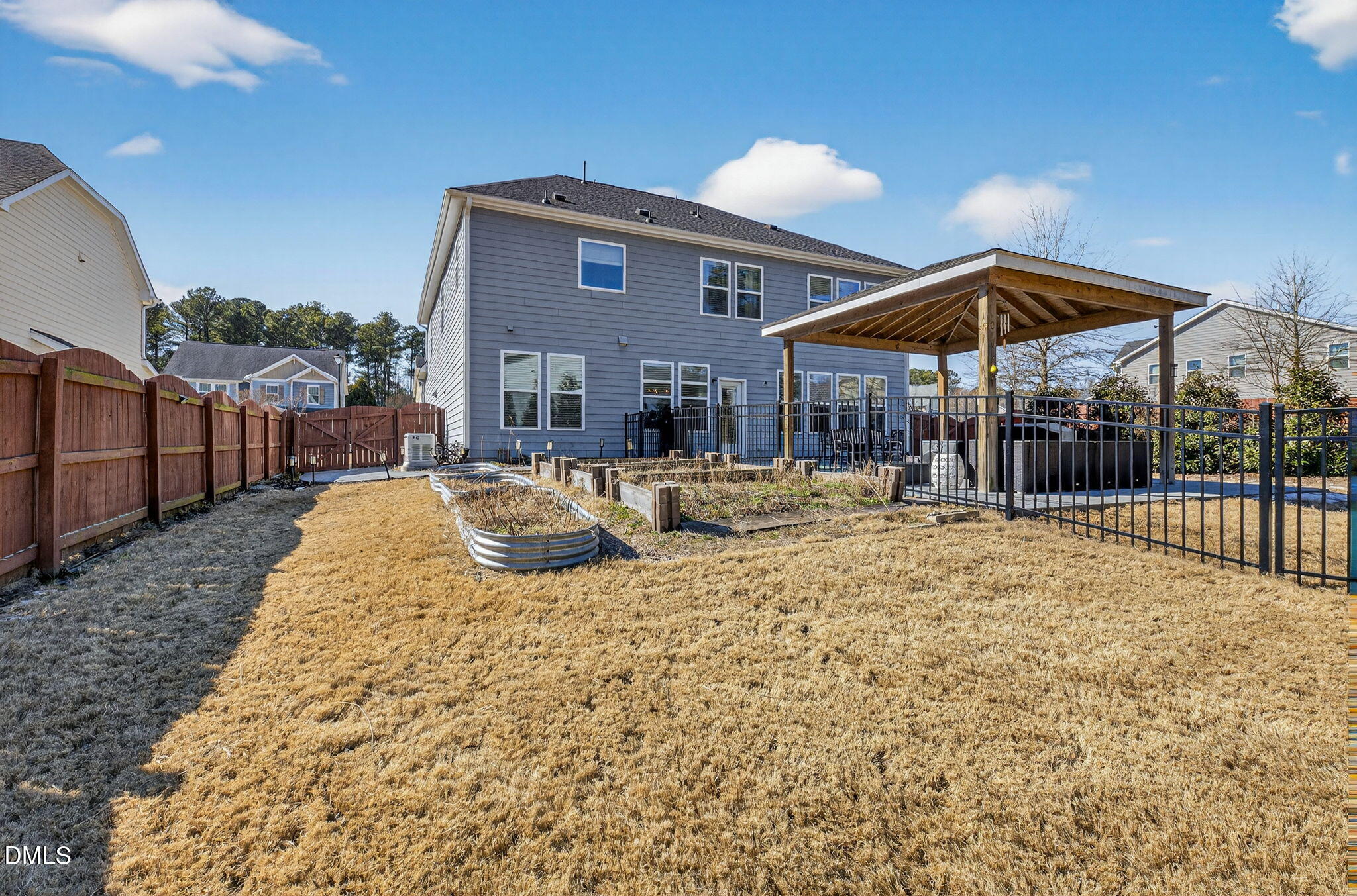 801 Tree Green Lane Wake Forest, NC 27587 - Photo 27 of 28 a view of a house with backyard and sitting area