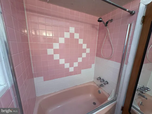 a kitchen with stainless steel appliances a refrigerator sink and microwave