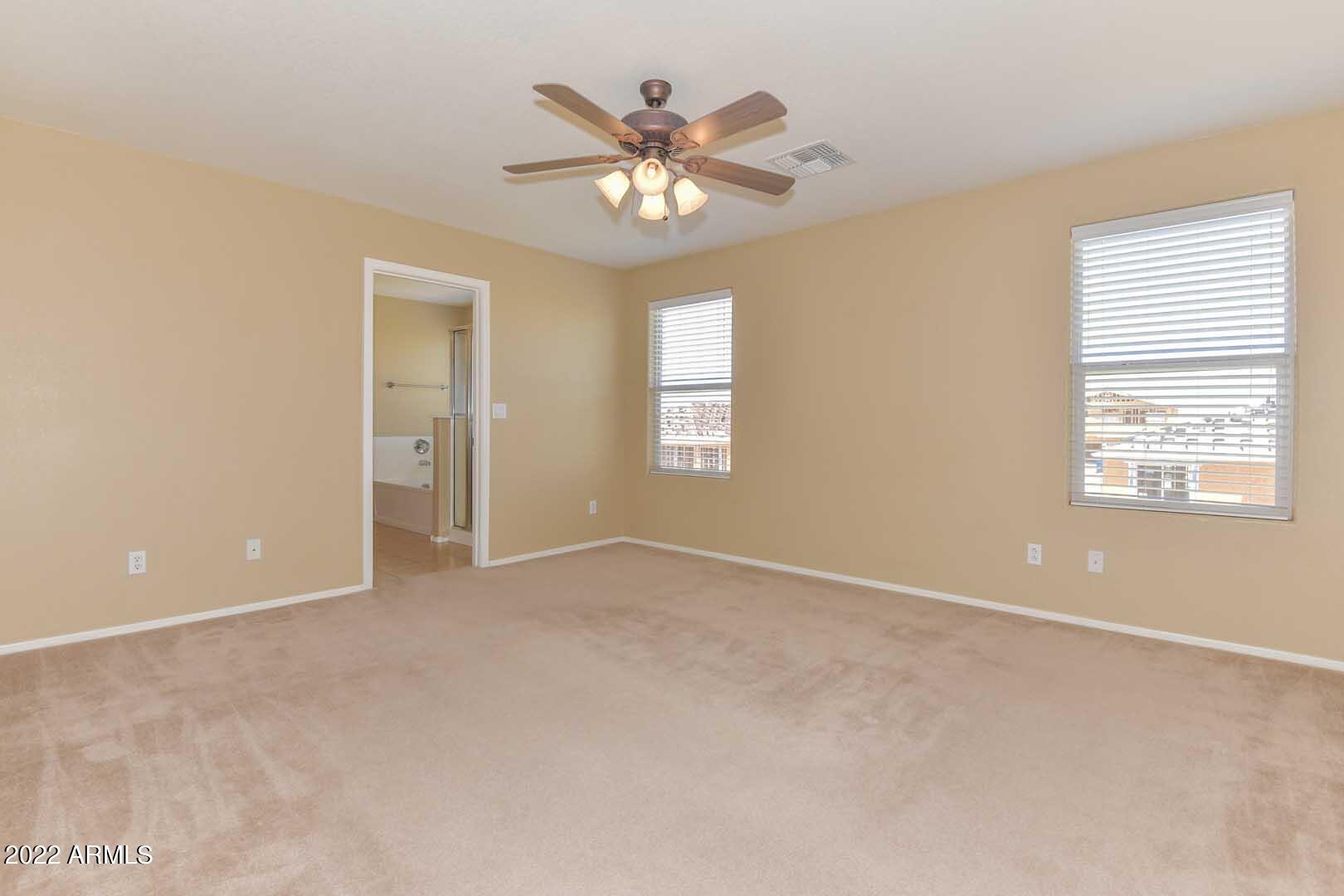17682 West Red Bird Road Surprise, AZ 85387 - Photo 19 of 42 Master Bedroom-Bath