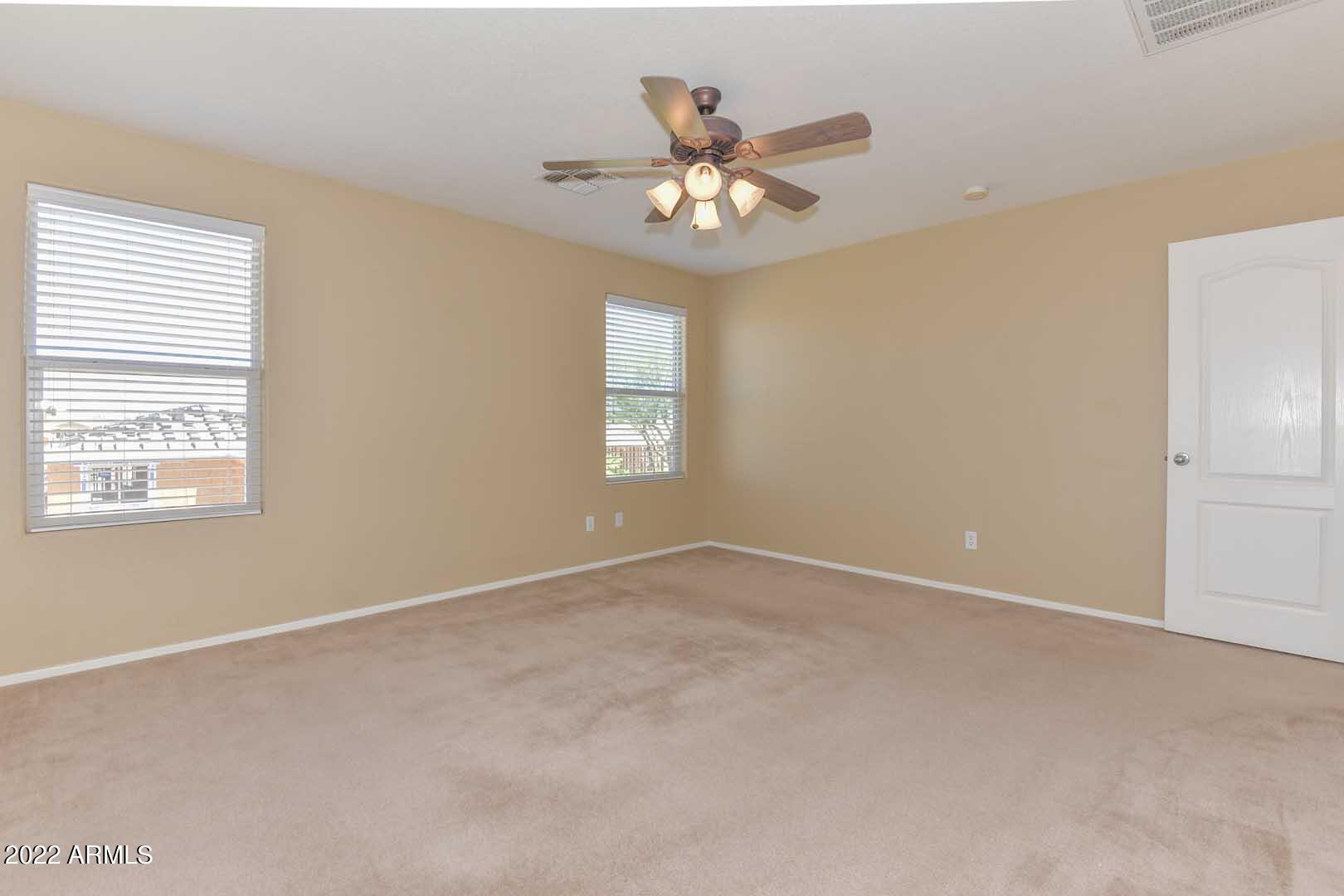 17682 West Red Bird Road Surprise, AZ 85387 - Photo 20 of 42 Master Bedroom