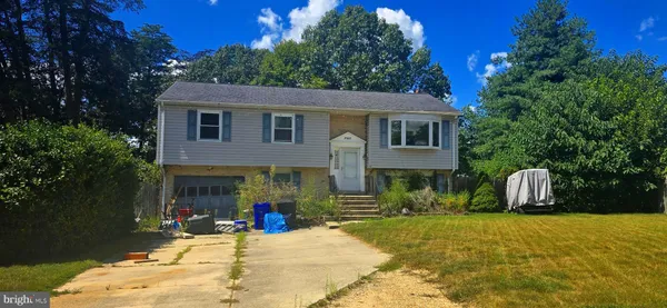 a view of house with outdoor space and sitting space