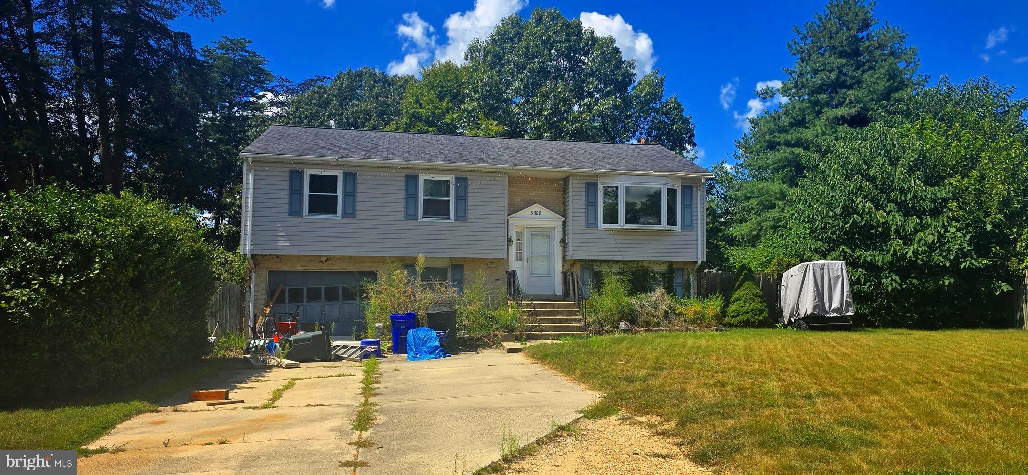 9508 Mellow Court Laurel, MD 20723 - Photo 1 of 23 a view of house with outdoor space and sitting space