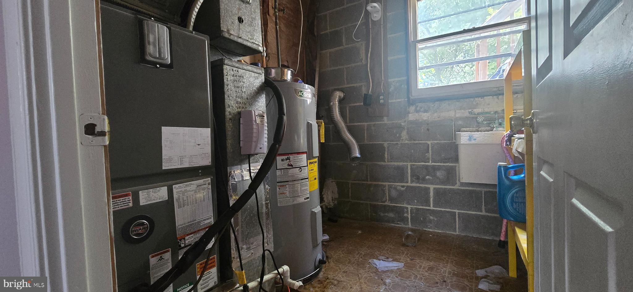 9508 Mellow Court Laurel, MD 20723 - Photo 18 of 23 a view of water heater room