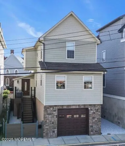 a front view of a house with glass door