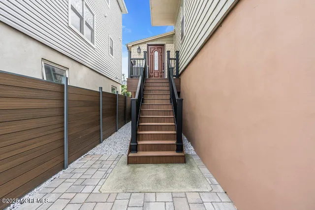 a view of entryway with stairs