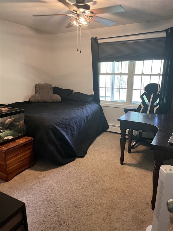 290 Woods Road Barre, MA 01005 - Photo 8 of 13 a bedroom with a bed and a window