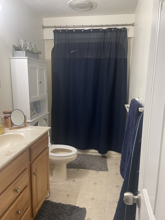 290 Woods Road Barre, MA 01005 - Photo 9 of 13 a bathroom with a granite countertop sink toilet and shower