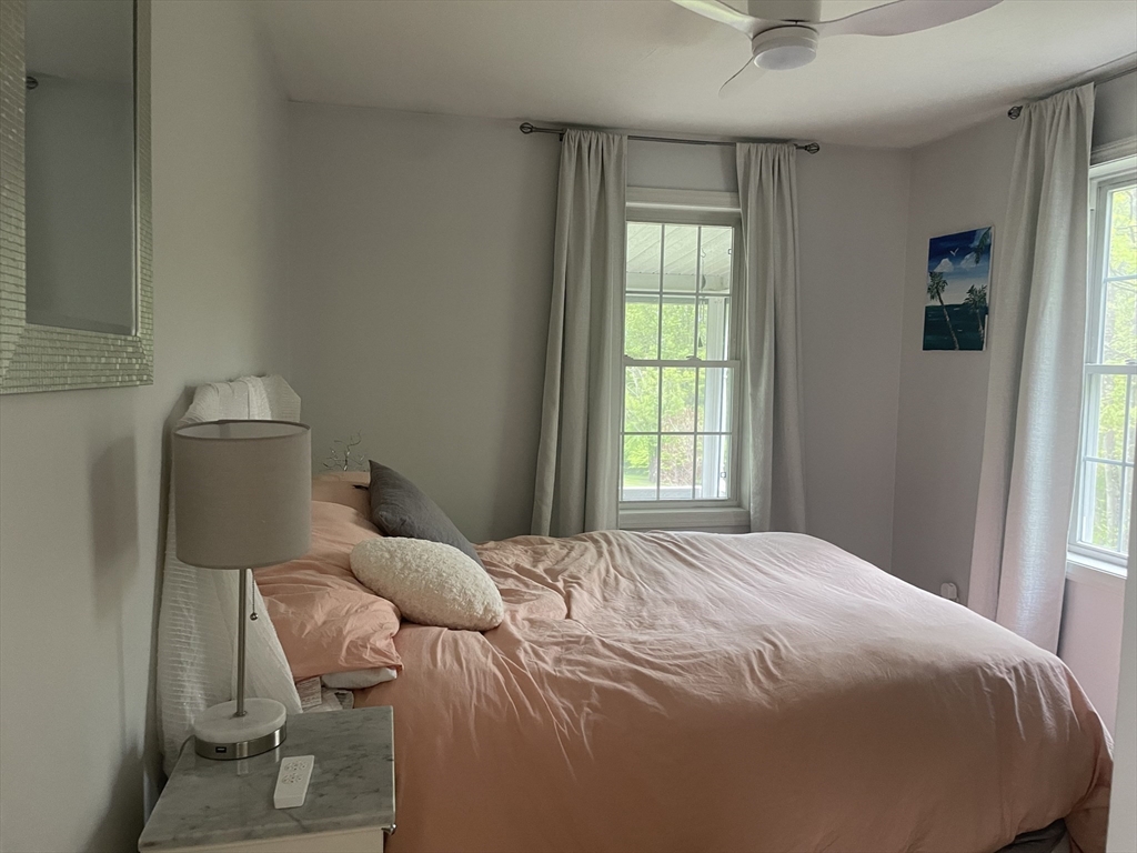 290 Woods Road Barre, MA 01005 - Photo 10 of 13 a bedroom with a bed and a window