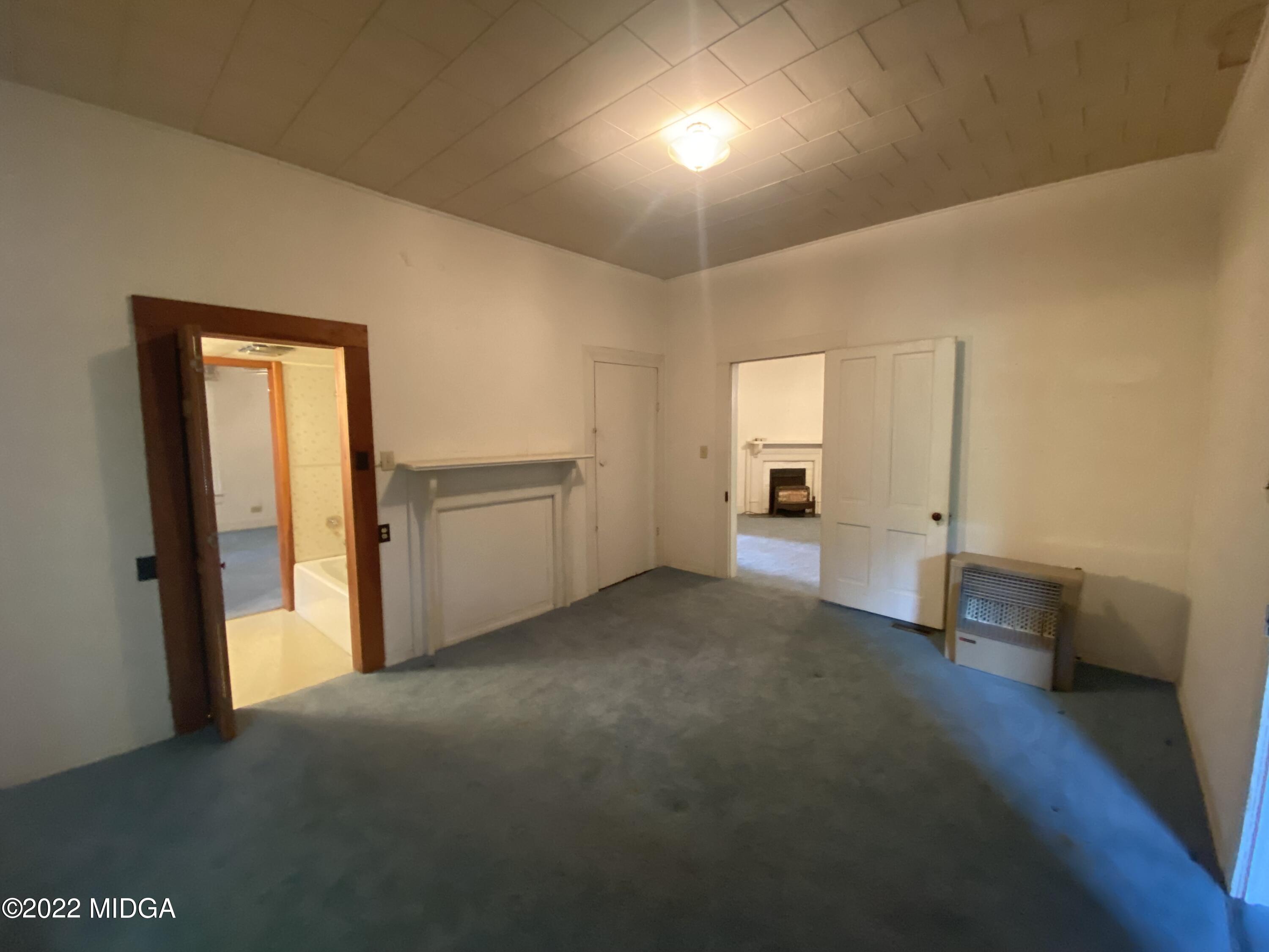 2949 South Lizella Road Lizella, GA 31052 - Photo 7 of 10 a view of empty room with a window