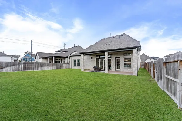 a view of a yard in front of a house