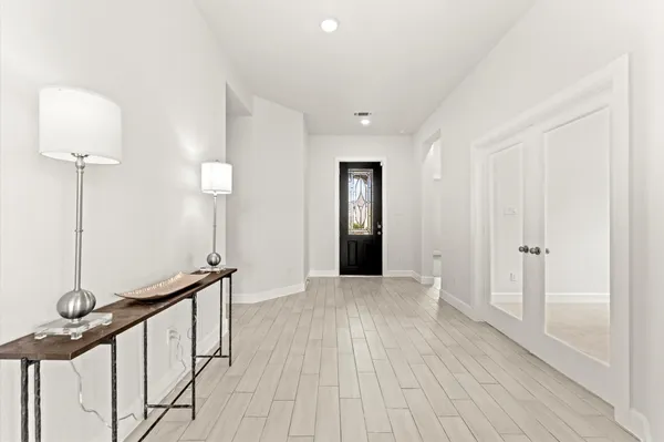 a view of an empty room and a gallery