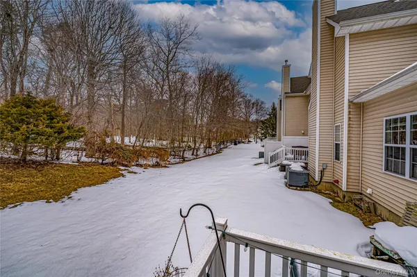 a view of a backyard of the house