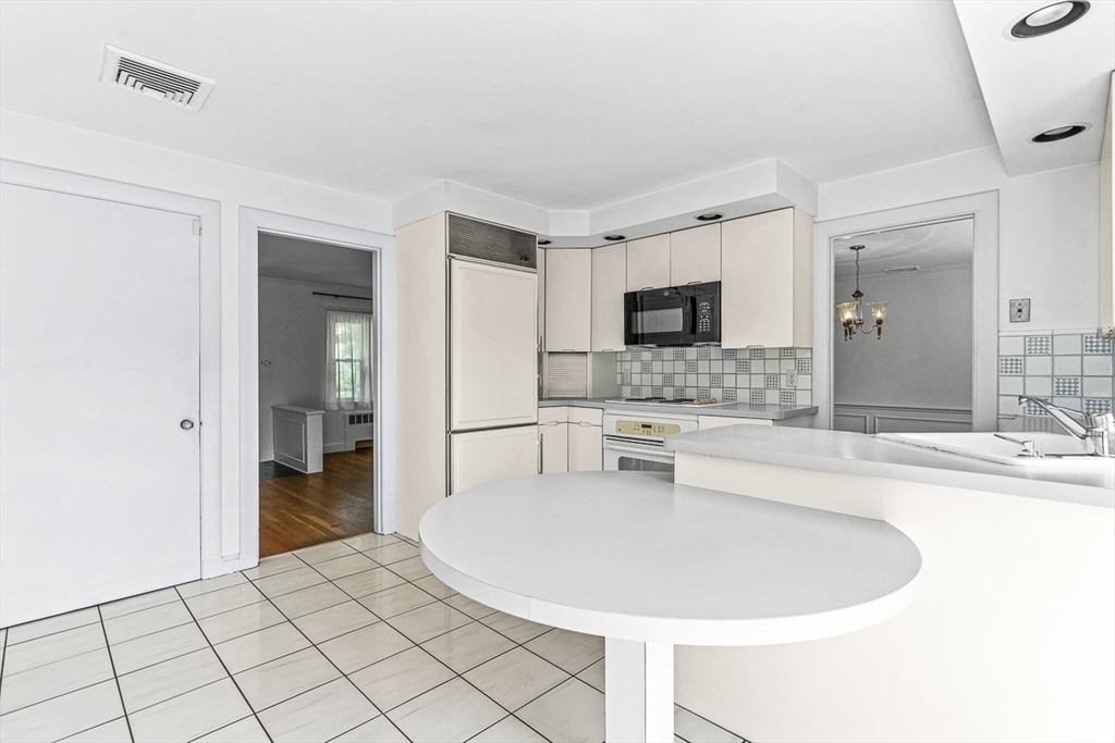 6 Old Colony Road Arlington, MA 02474 - Photo 6 of 15 a spacious bathroom with a bathtub and a sink