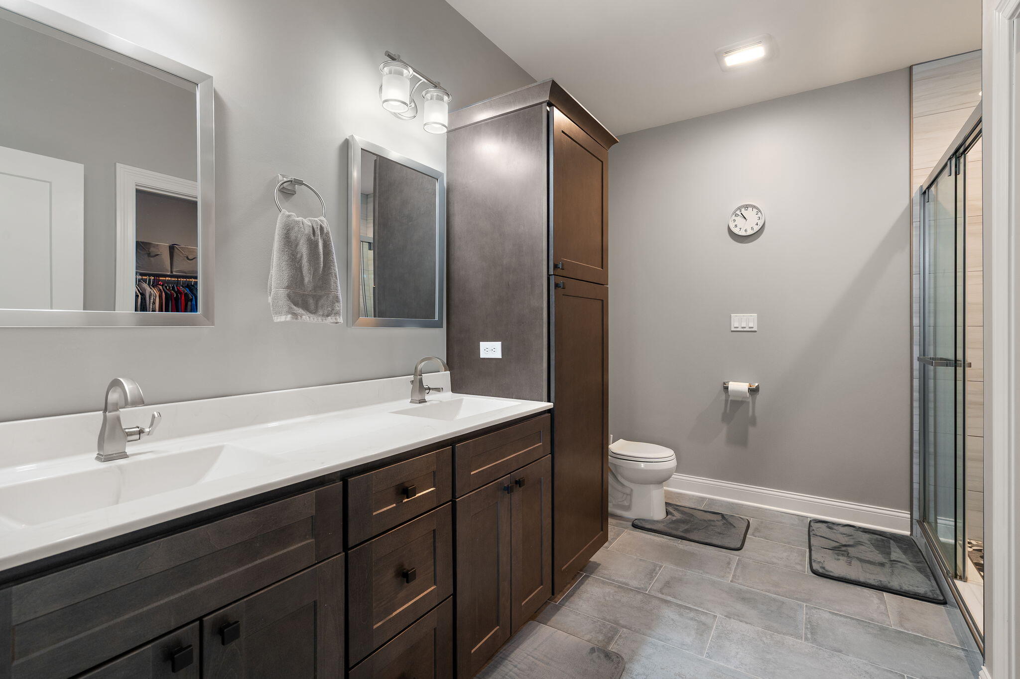 512 West Joliet Street Crown Point, IN 46307 - Photo 21 of 47 a bathroom with a double vanity sink toilet and mirror