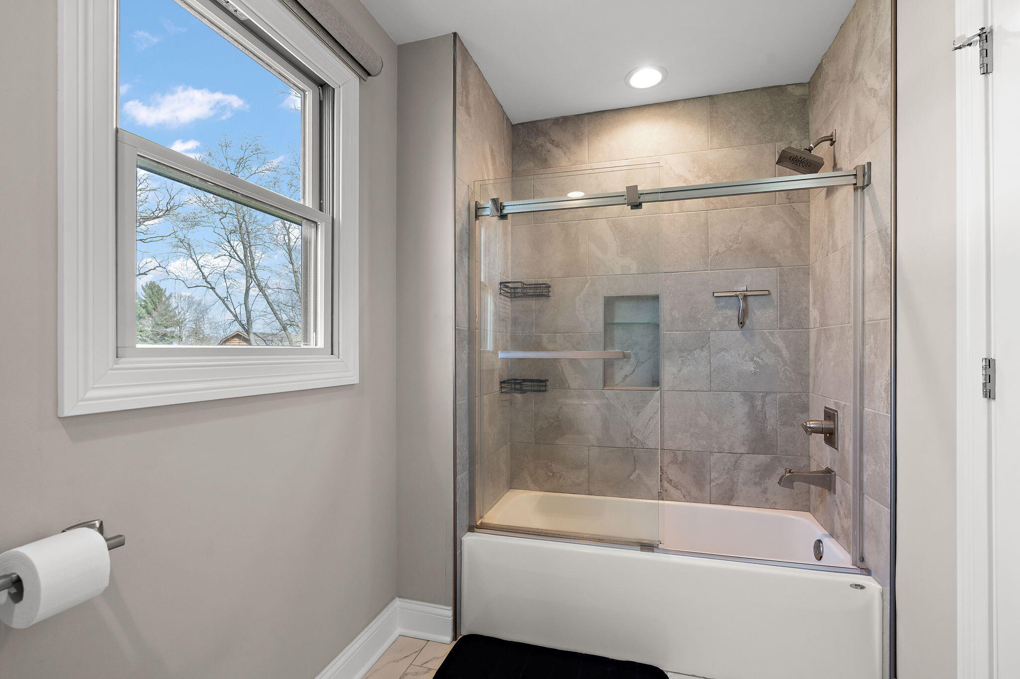 512 West Joliet Street Crown Point, IN 46307 - Photo 31 of 47 a bathroom with a bathtub and a shower