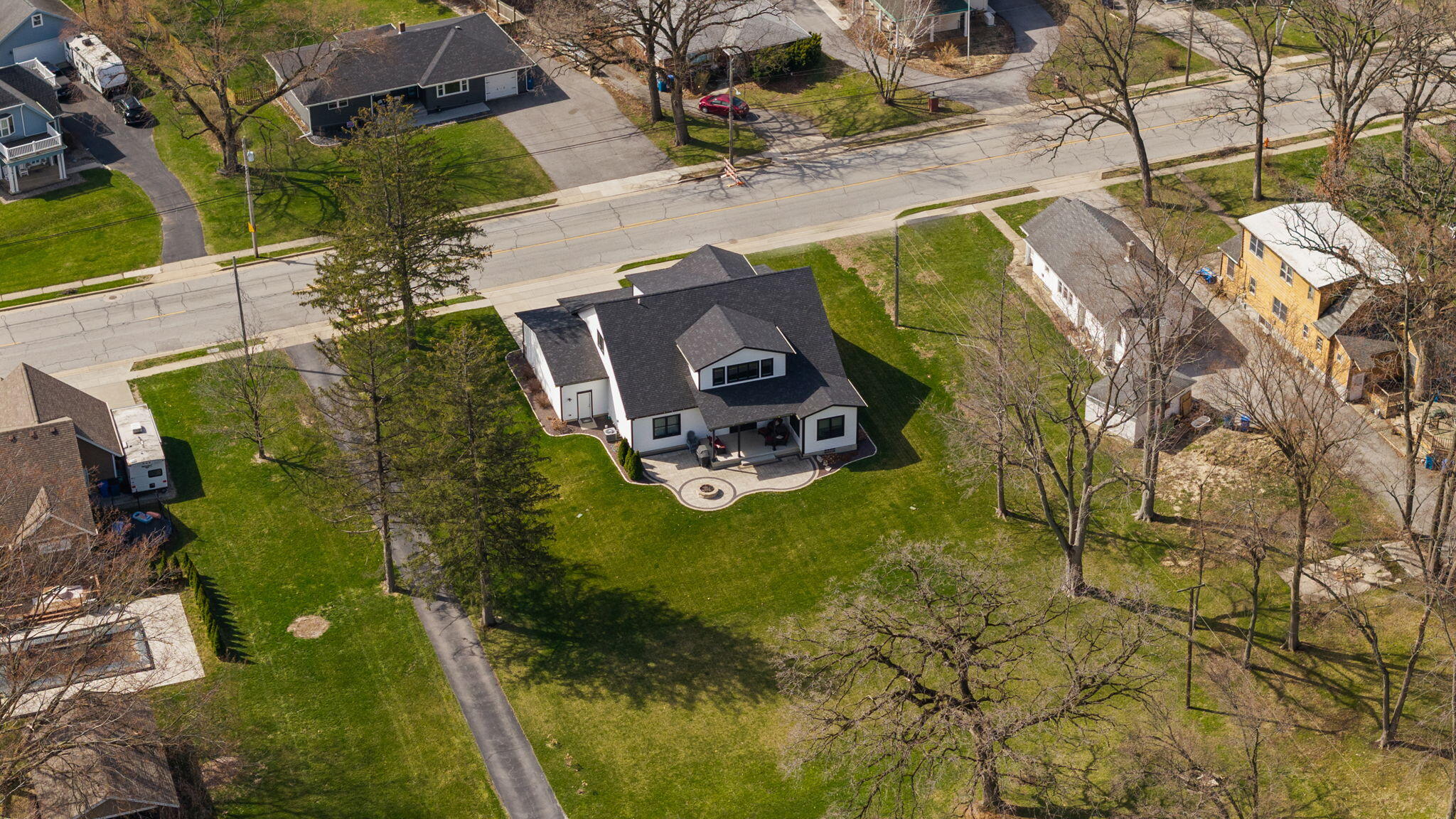 512 West Joliet Street Crown Point, IN 46307 - Photo 45 of 47 an aerial view of a house with a garden and swimming pool