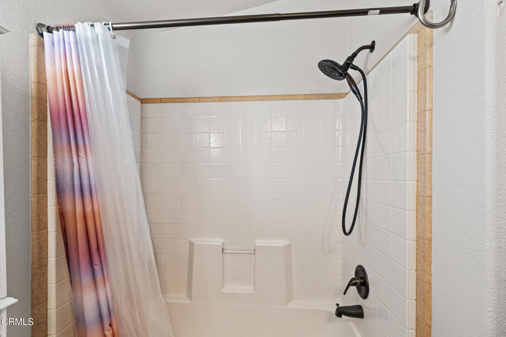 24 Via Rosal, Unit 24 Camarillo, CA 93012 - Photo 20 of 40 a bathroom with a shower and a sink