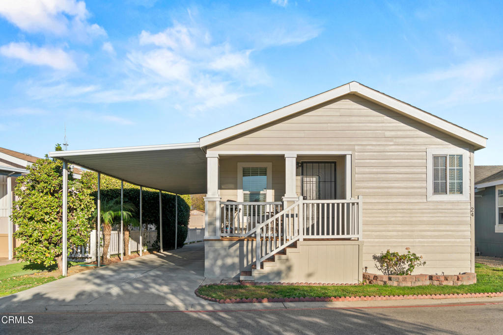 24 Via Rosal, Unit 24 Camarillo, CA 93012 - Photo 3 of 40 a front view of a house with a porch