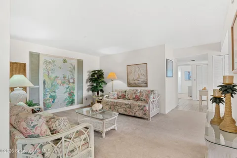 a bedroom with furniture and a dresser