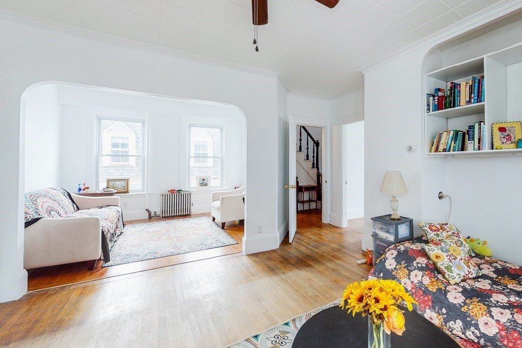 26 Clark Street Somerville, MA 02143 - Photo 11 of 32 a living room with furniture and a wooden floor