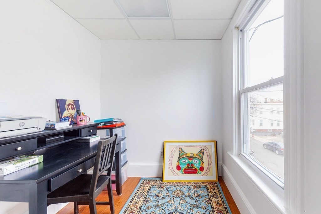 26 Clark Street Somerville, MA 02143 - Photo 14 of 32 a workspace with furniture and window