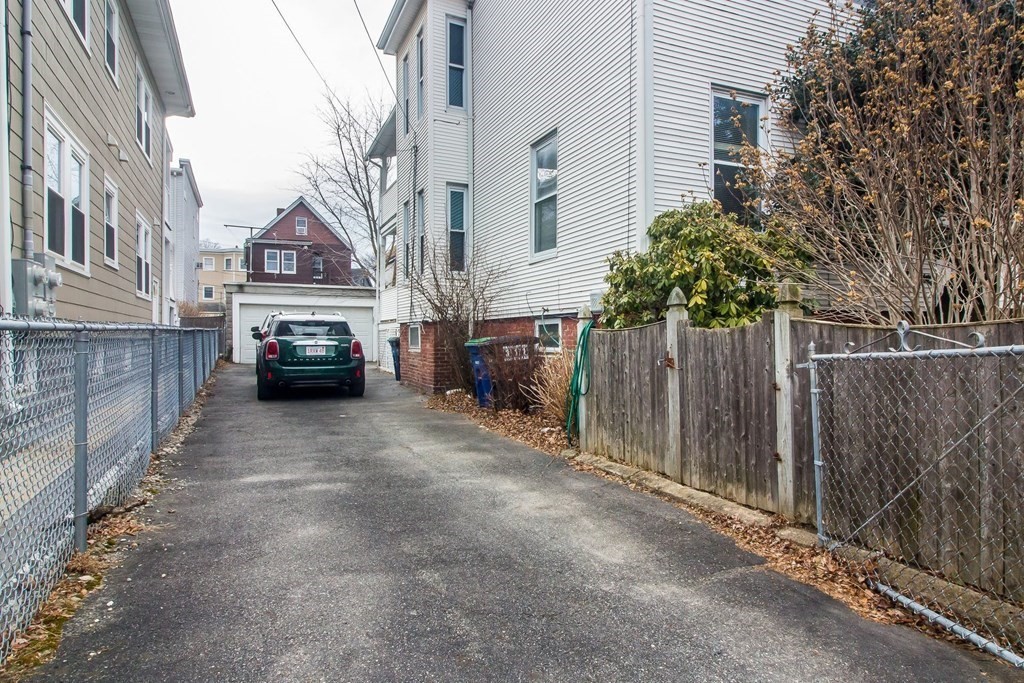 26 Clark Street Somerville, MA 02143 - Photo 28 of 32 a view of street with parked cars