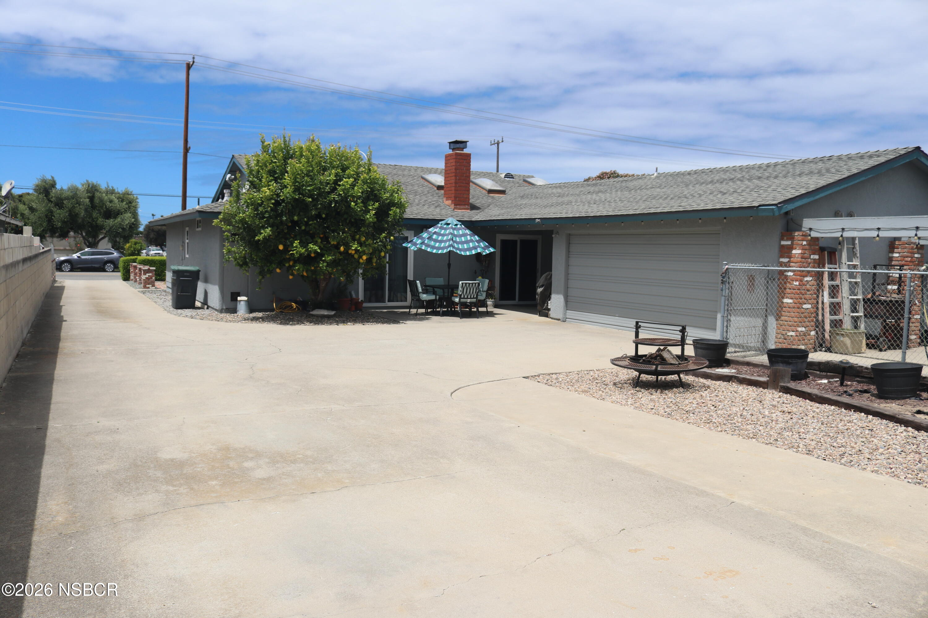 812 North D Street Lompoc, CA 93436 - Photo 29 of 34 Backyard Driveway