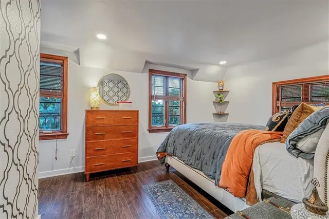 a bedroom with a bed and a closet