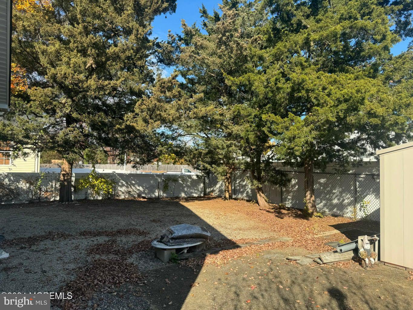 16 Mandalay Road Brick, NJ 08723 - Photo 12 of 22 a view of a yard with plants and trees