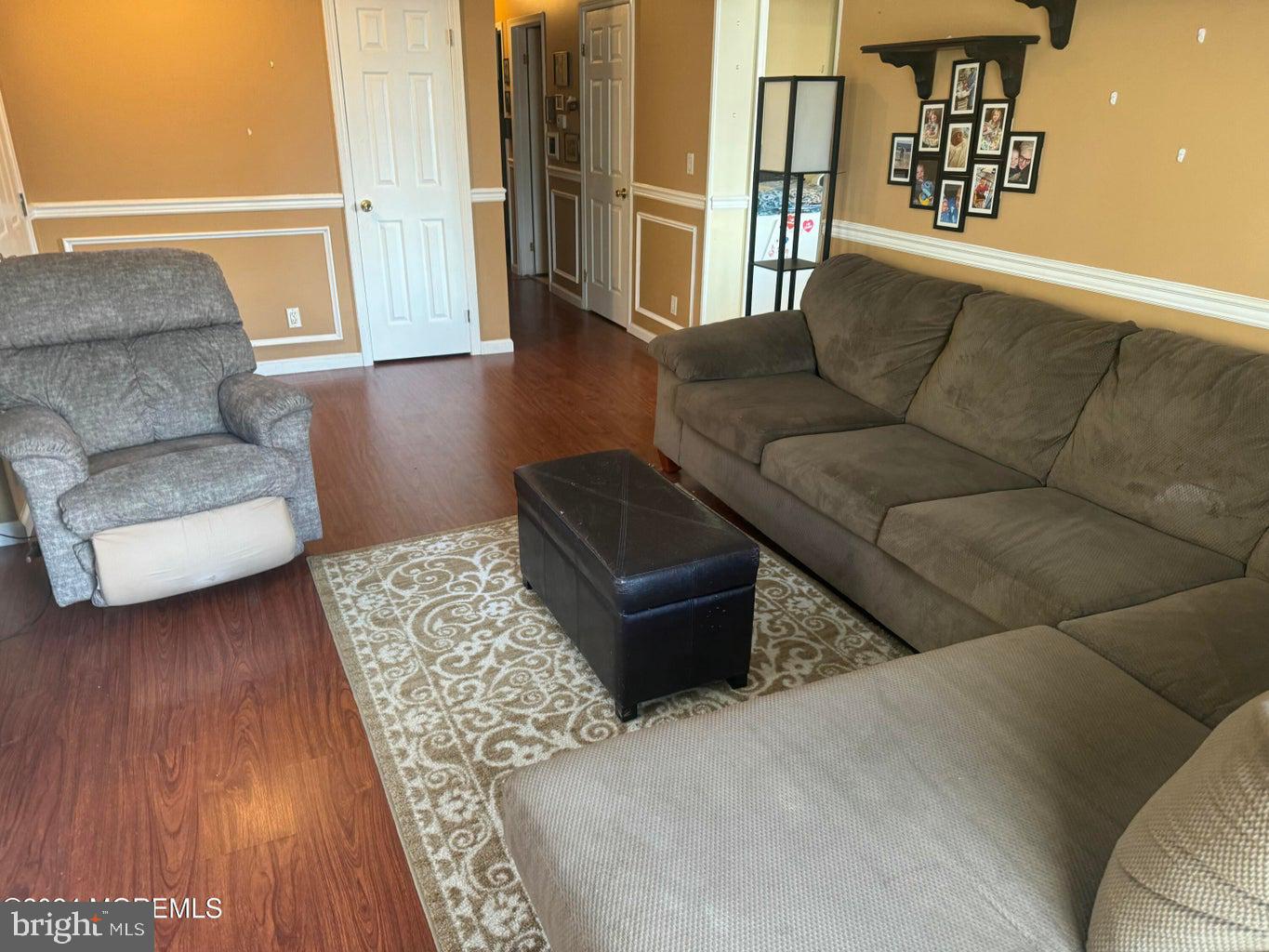 16 Mandalay Road Brick, NJ 08723 - Photo 3 of 22 a living room with furniture and wooden floor