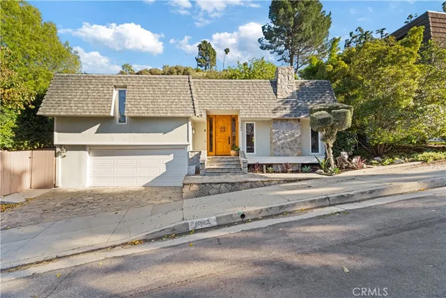 front view of a house with a street
