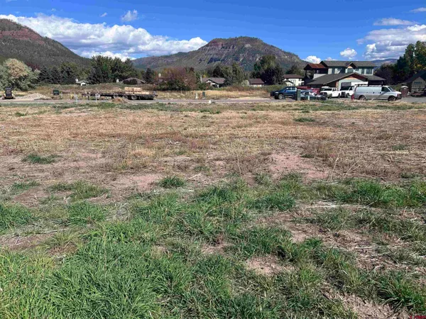 a view of outdoor space with swimming pool and mountain view