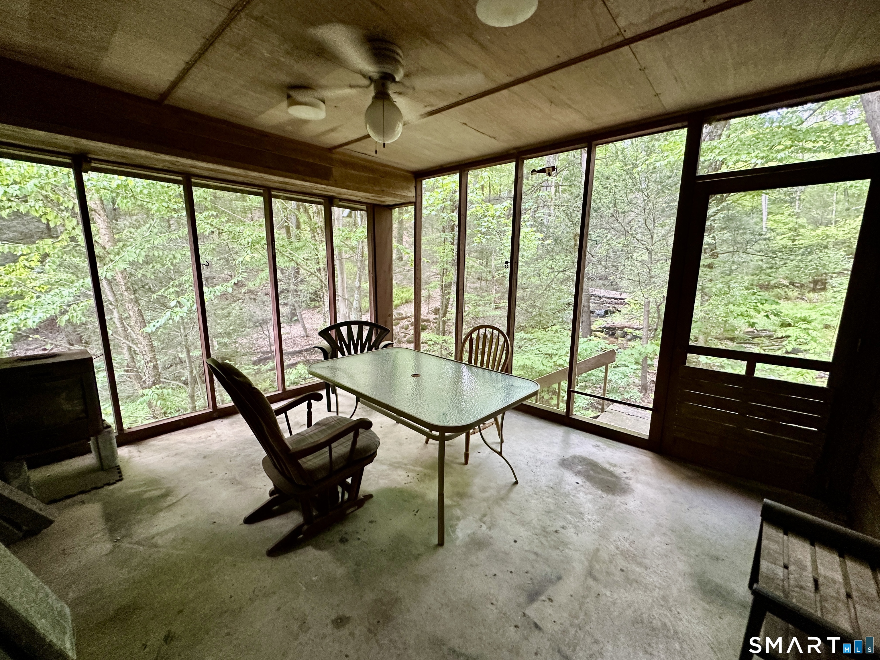 63 Fox Brook Road Hartland, CT 06027 - Photo 9 of 40 Screen Porch with concrete floor
