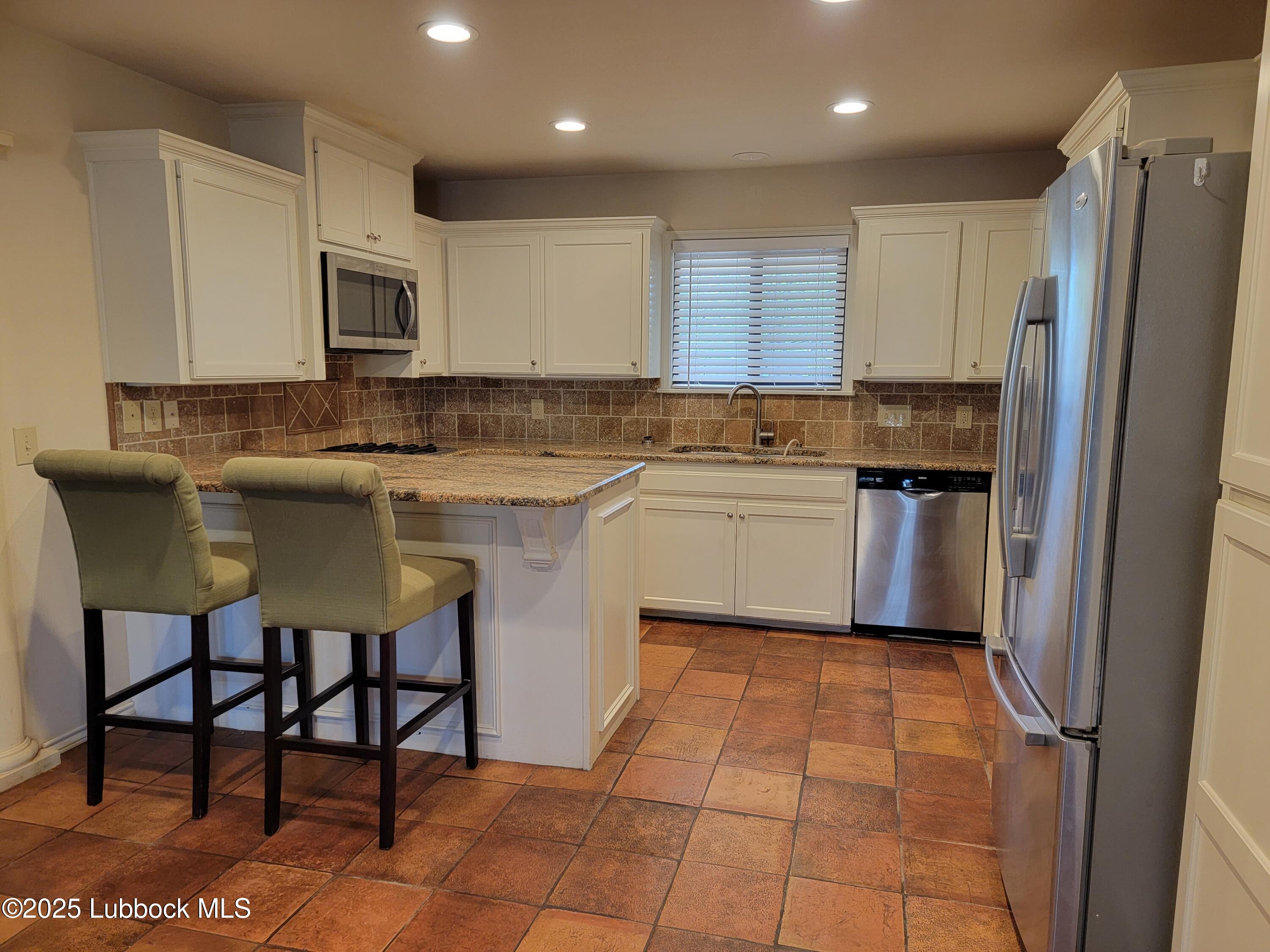 3206 69th Street Lubbock, TX 79413 - Photo 6 of 25 20230415_134017