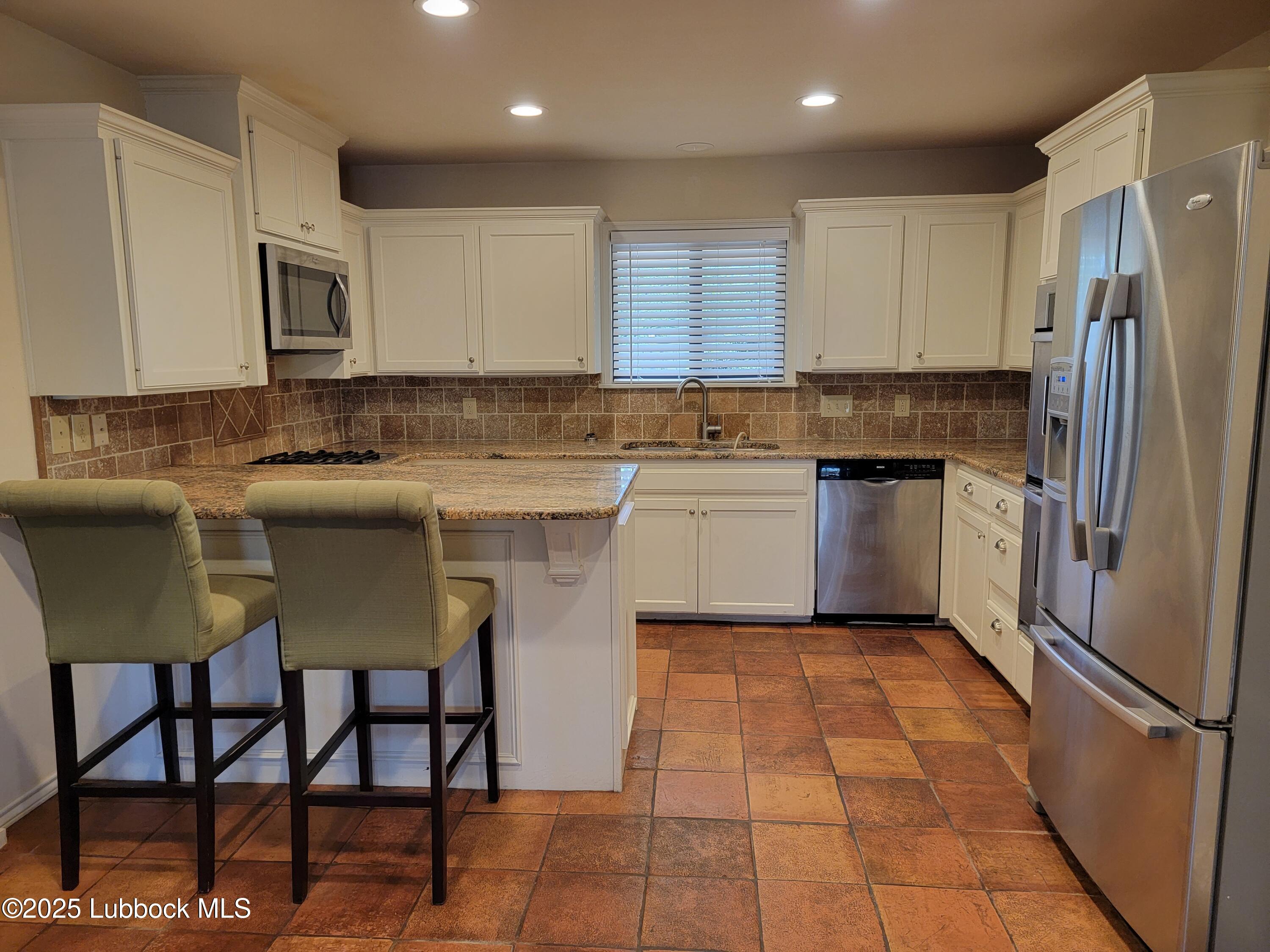 3206 69th Street Lubbock, TX 79413 - Photo 7 of 25 20230415_134034