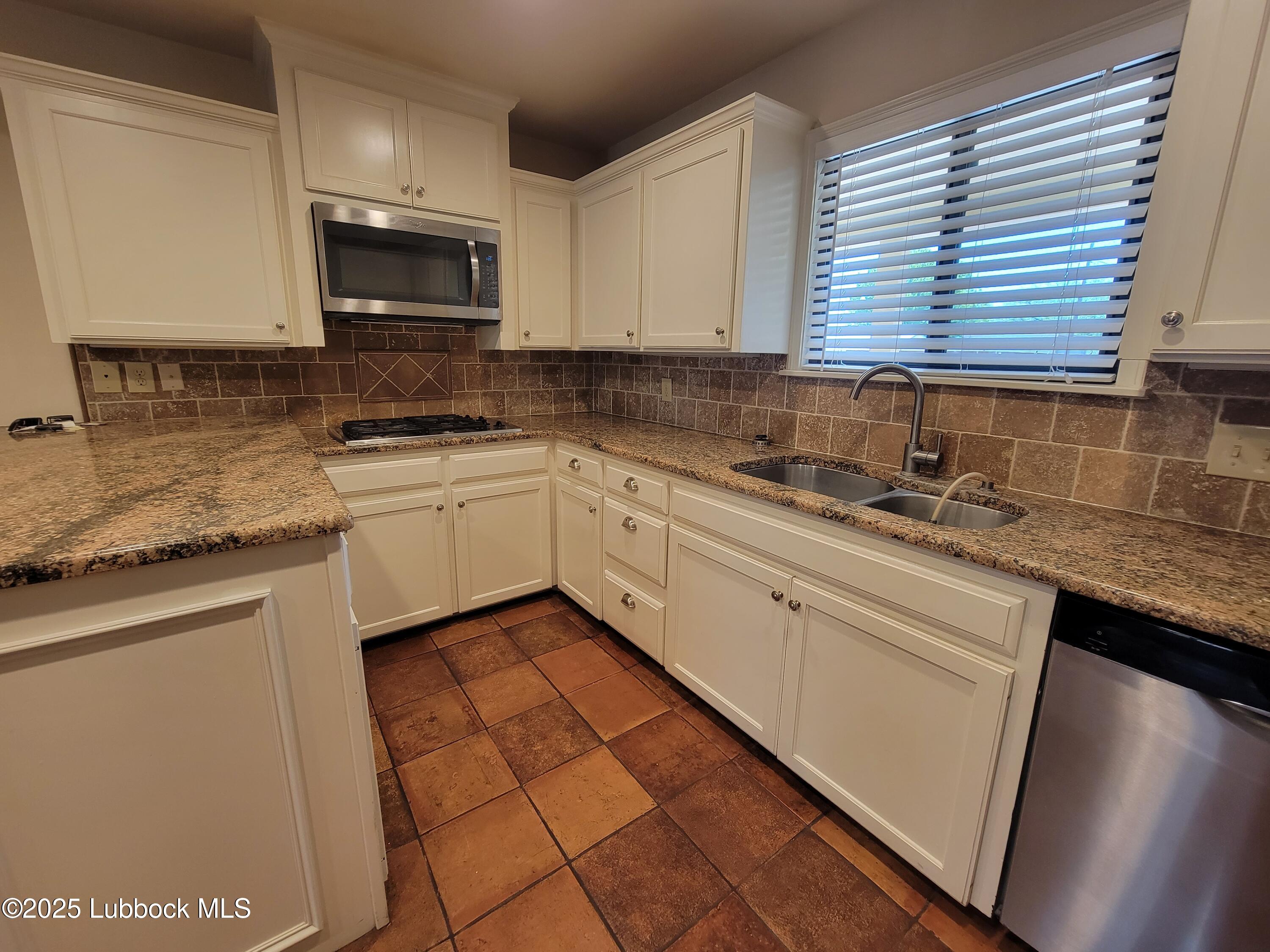 3206 69th Street Lubbock, TX 79413 - Photo 8 of 25 20230415_134041