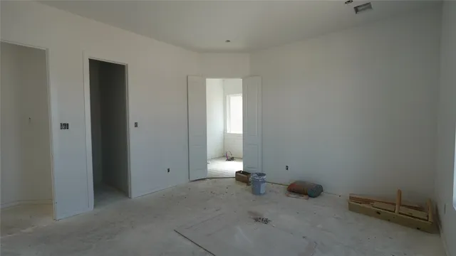 an empty room with windows