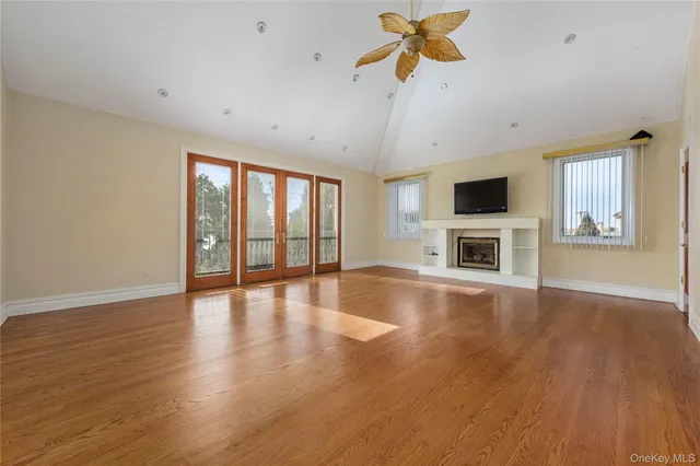 a kitchen with granite countertop wooden cabinets and stainless steel appliances