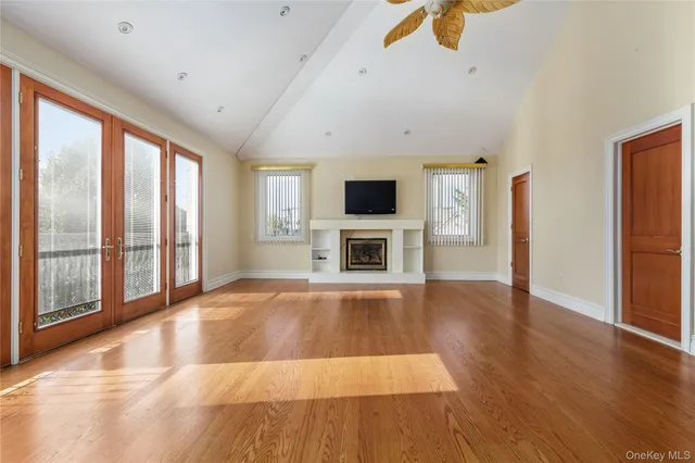 a kitchen with stainless steel appliances granite countertop wooden cabinets a stove top oven a sink and dishwasher