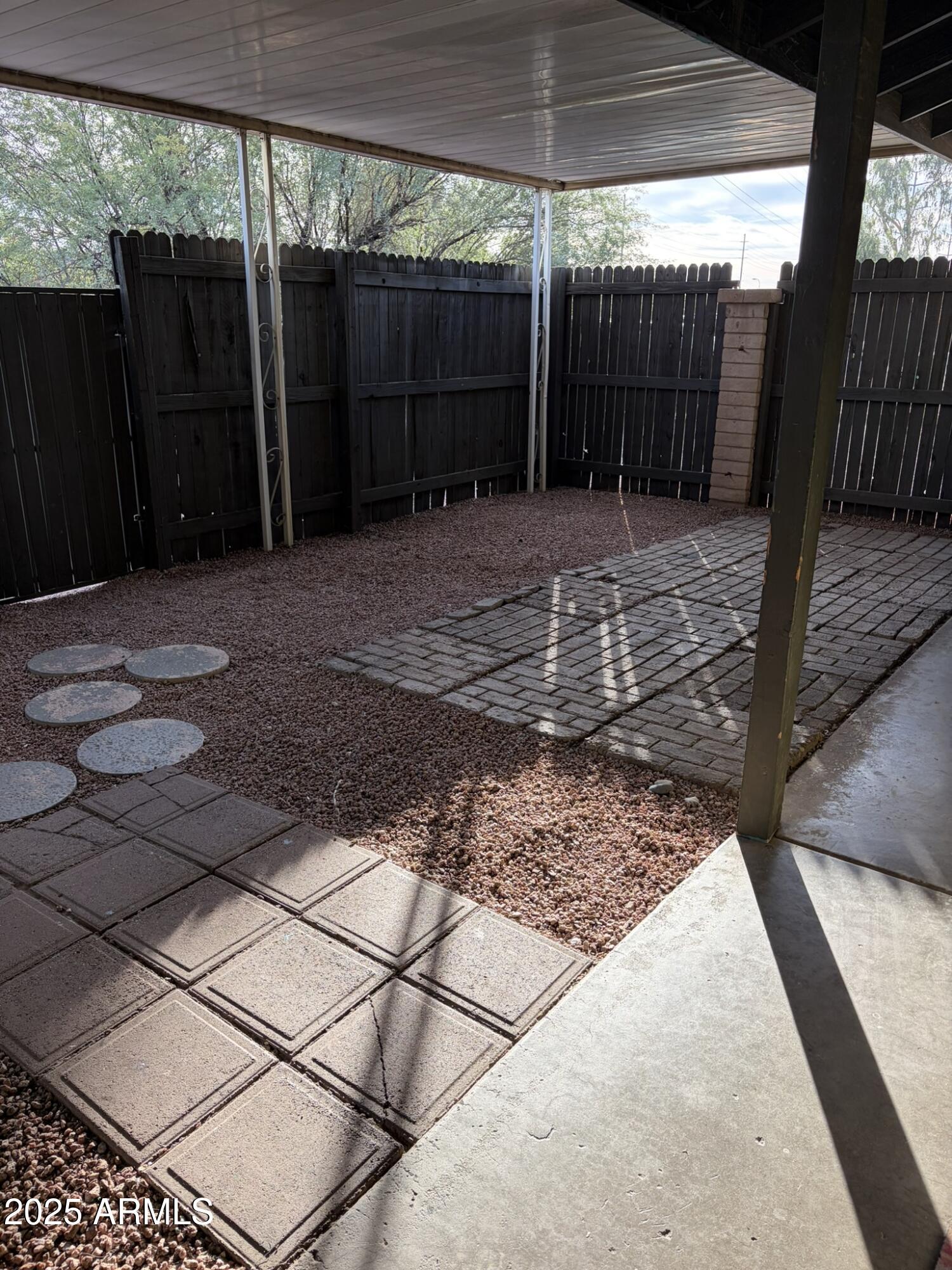 463 North 64th Place, Unit 1 Mesa, AZ 85205 - Photo 14 of 19 a view of a backyard