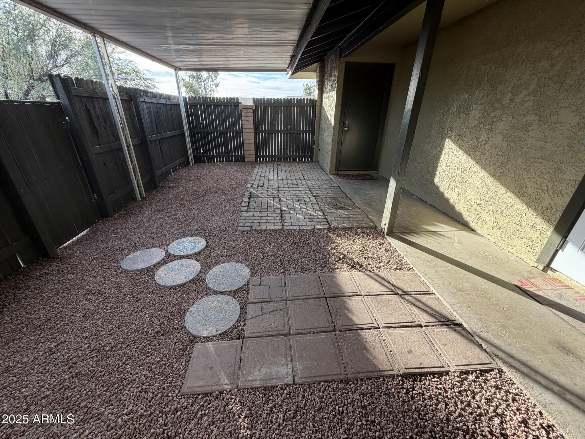 463 North 64th Place, Unit 1 Mesa, AZ 85205 - Photo 17 of 19 a view of a backyard